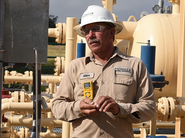 A guy in a hard hat who looks engaged